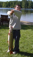 Erik Hornberger and 8 lb Pike (August 2002).